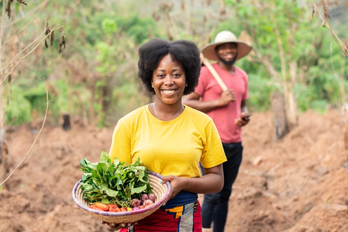 Woman and man farming in Africa